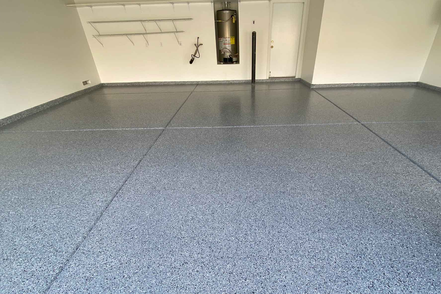 Garage floor after gray flake epoxy coating