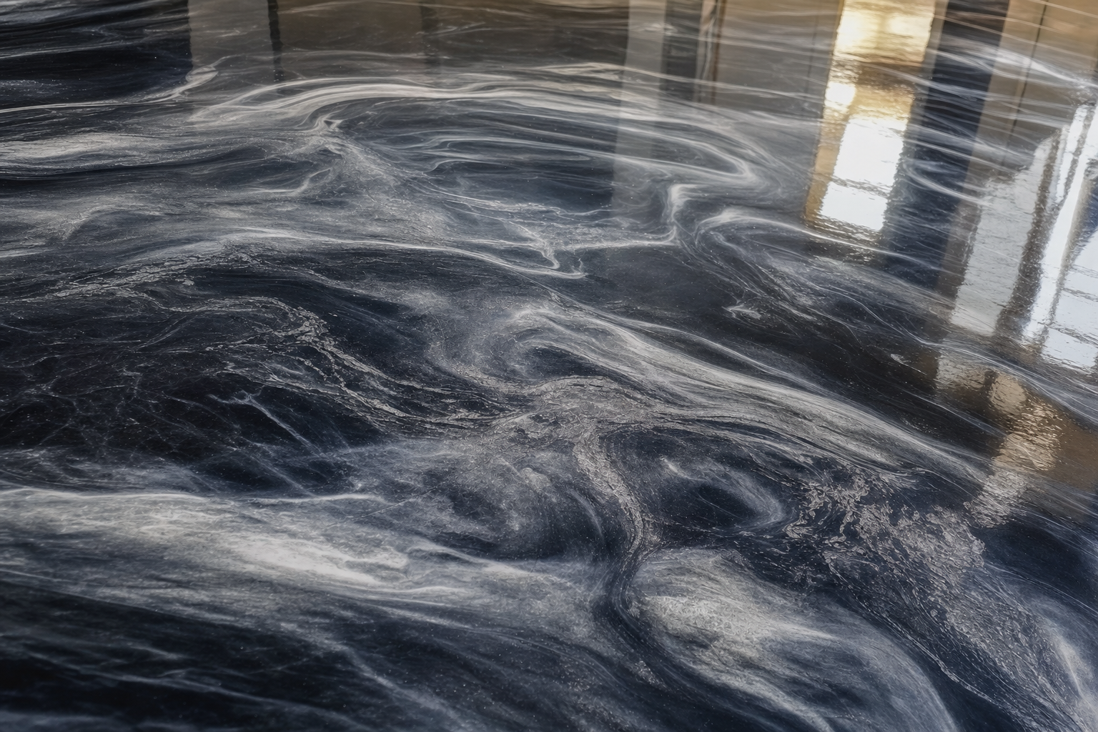 Close-up of black and white metallic epoxy with silver swirls