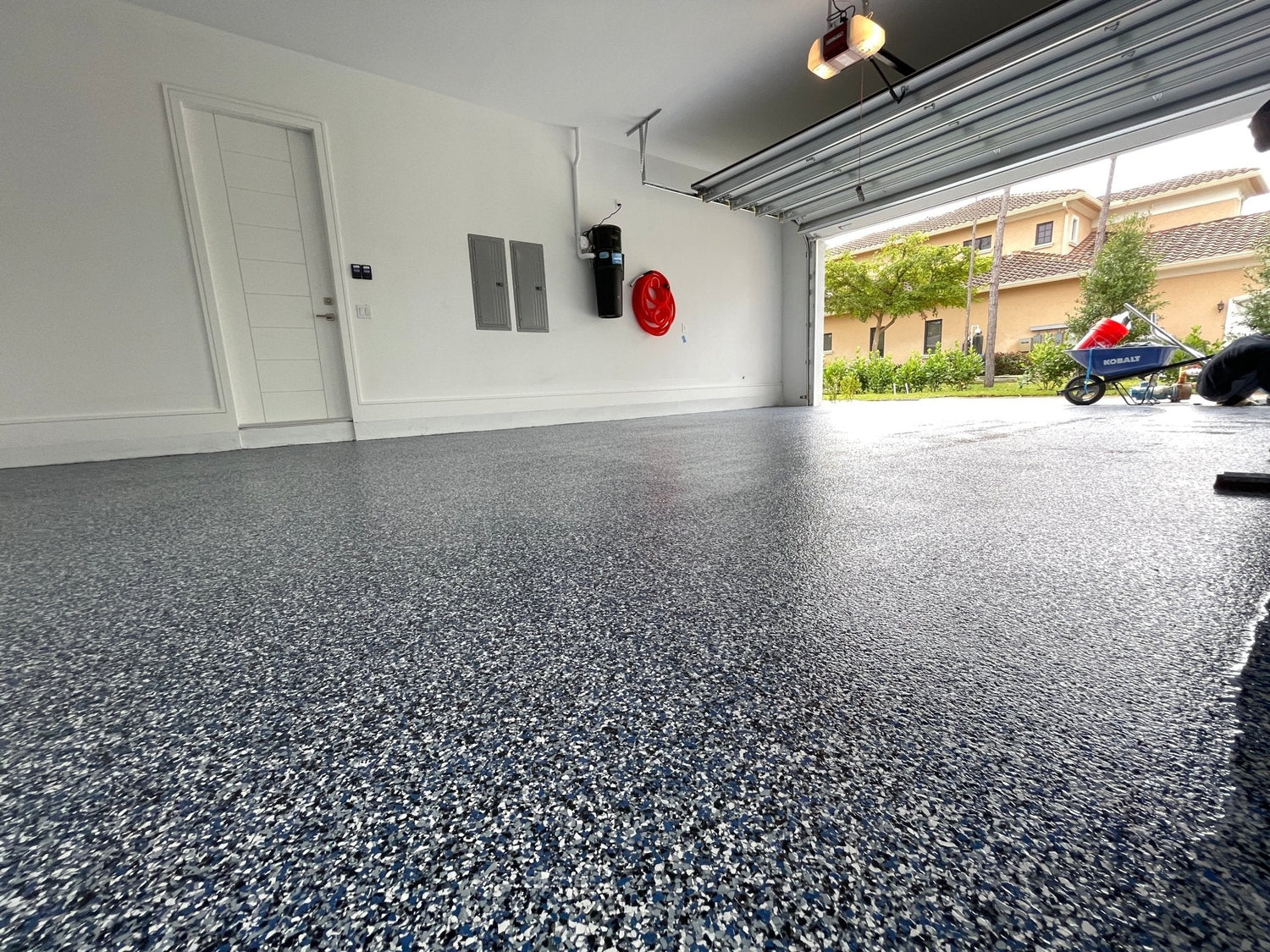 Brown and tan flake system epoxy garage floor